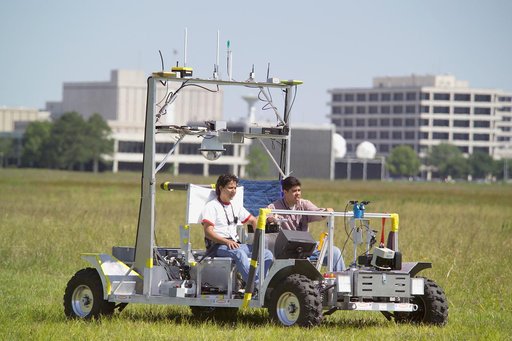 JSC Features - SCOUT Rover testing with Advanced EVA Suit on JSC Fields