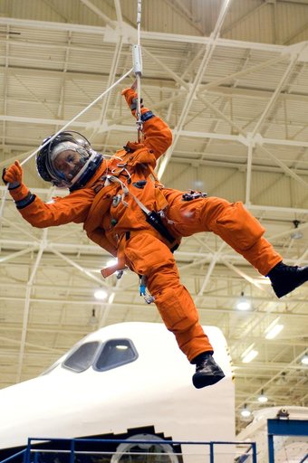 STS-116 payload egress training