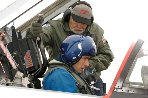 STS-117 crew members Frederick Sturckow and Lee Archambault leaving in T-38
