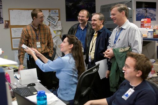 STS-116 Flight Controllers on console during mission - Orbit 3