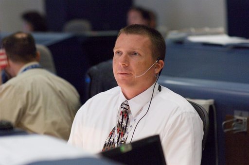 STS-120 Flight Controllers on console during mission (Launch) - (Bldg. 30s, WFCR)