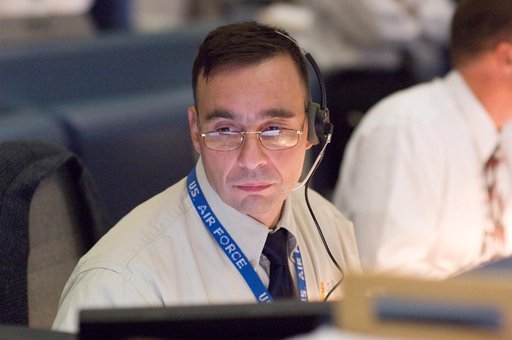 STS-120 Flight Controllers on console during mission (Launch) - (Bldg. 30s, WFCR)