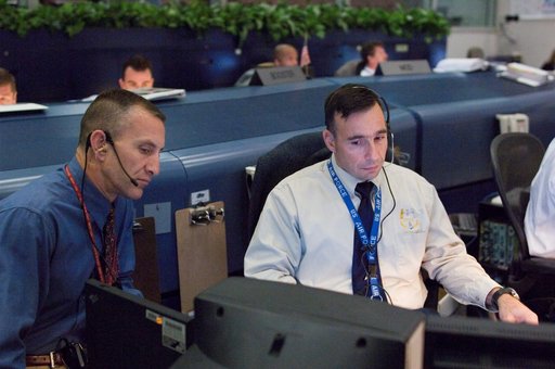 STS-120 Flight Controllers on console during mission (Launch) - (Bldg. 30s, WFCR)