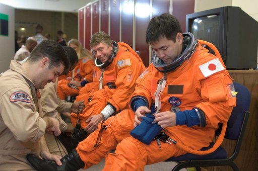 STS-124 during crew/training team photos, suit up and ASC/CAP/DES training