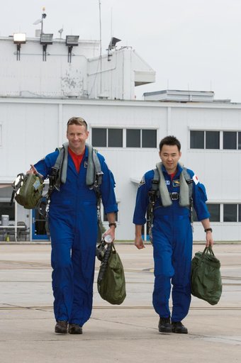 STS-124 crew members as they prepare for their T-38 flight to KSC