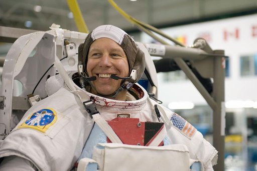 STS-127 astronauts Dave Wolf and Tim Kopra during STS-127 2J/A EVA training at the NBL