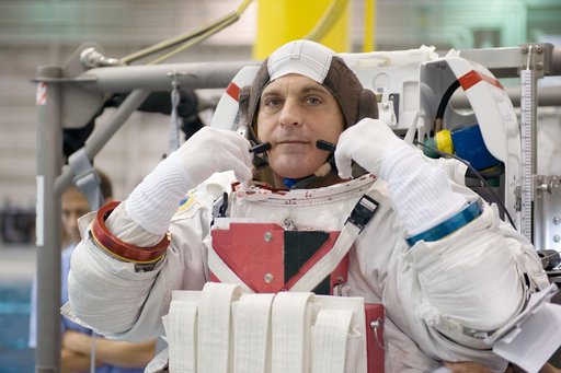 STS-127 astronauts Dave Wolf and Tim Kopra during STS-127 2J/A EVA training at the NBL