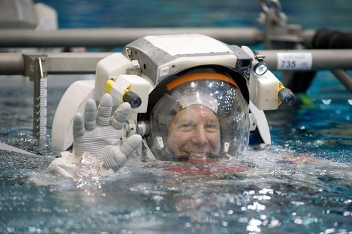 STS-127 astronauts Dave Wolf and Tim Kopra during STS-127 2J/A EVA training at the NBL