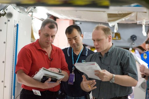 Expedition 22 crew member Soichi Noguchi performing emergency procedure training.