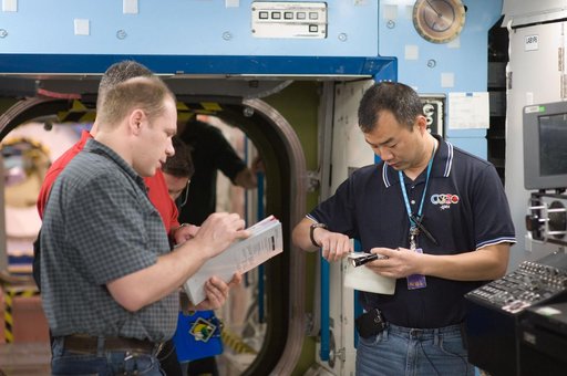 Expedition 22 crew member Soichi Noguchi performing emergency procedure training.
