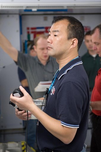 Expedition 22 crew member Soichi Noguchi performing emergency procedure training.