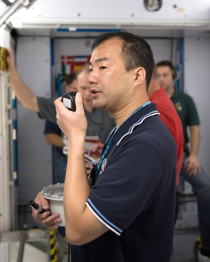 Expedition 22 crew member Soichi Noguchi performing emergency procedure training.