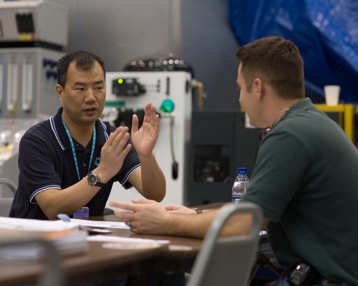 Expedition 22 crew member Soichi Noguchi performing emergency procedure training.