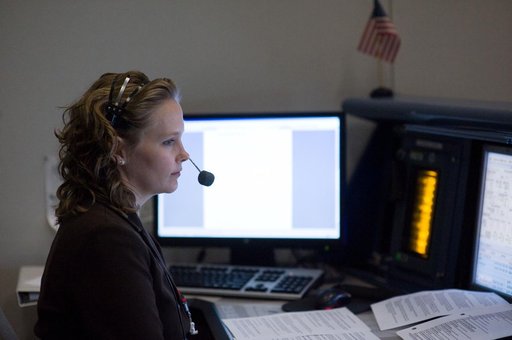 STS-119 Flight Controllers on Console - Launch - Bldg. 30south. Flight Director: Richard Jones