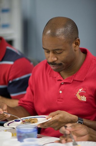 STS-129 food tasting  session.
