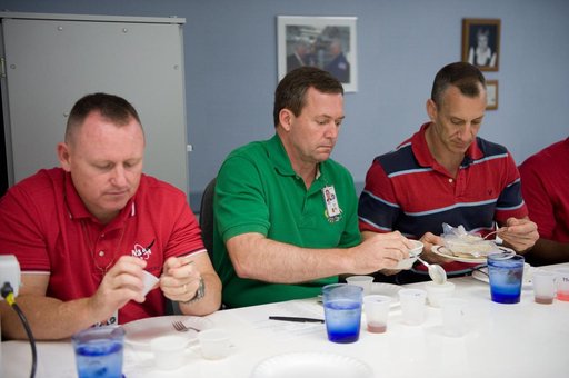 STS-129 food tasting  session.