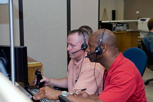 STS-129 crew training in the JSC VR lab during SSRMS refresher training.