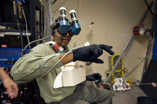 STS-129 crew training in the JSC VR lab during SSRMS refresher training.