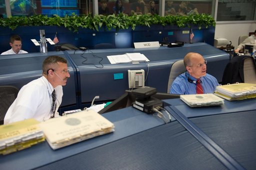 STS-125 Flight Controllers on Console During HST Grapple - Orbit 1. Flight Director: Tony Ceccacci