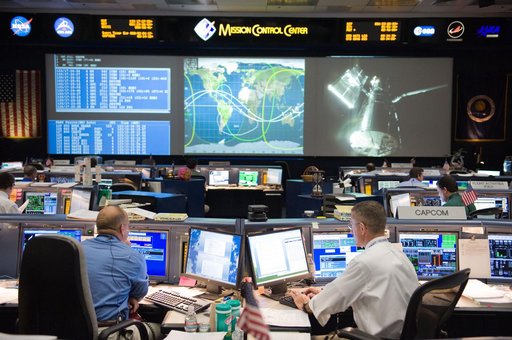 STS-125 Flight Controllers on Console During HST Grapple - Orbit 1. Flight Director: Tony Ceccacci