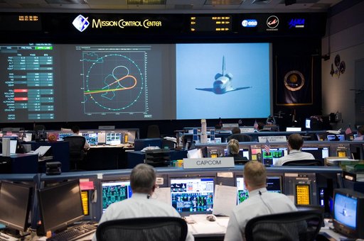 STS-125 Entry flight controllers on console with Flight Director Norman Knight