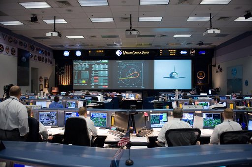 STS-125 Entry flight controllers on console with Flight Director Norman Knight