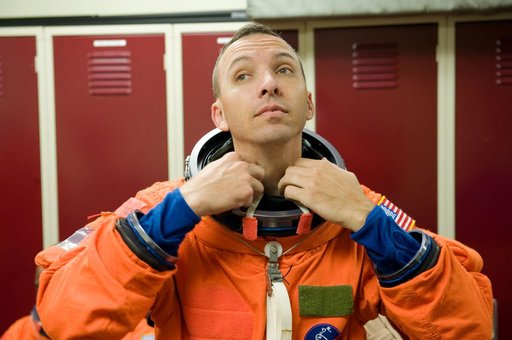 STS-129 Preflight Training. Suited payload egress training.