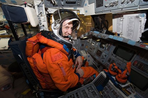STS-129 Preflight Training. Suited payload egress training.