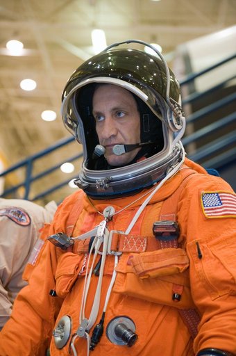 STS-129 Preflight Training. Suited payload egress training.