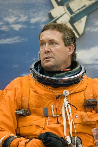 STS-129 Preflight Training. Suited payload egress training.