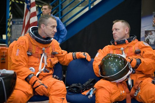 STS-129 Preflight Training. Suited payload egress training.