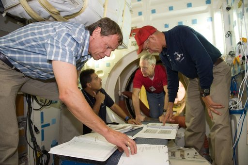 STS-128 crew during space station ingress/egress