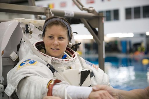 Expedition 24 crew members Tracy Caldwell and Doug Wheelock during ISS EVA 1 91027 training
