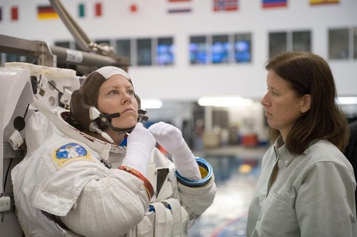 Expedition 24 crew members Tracy Caldwell and Doug Wheelock during ISS EVA 1 91027 training