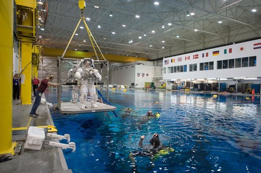 Expedition 24 crew members Tracy Caldwell and Doug Wheelock during ISS EVA 1 91027 training