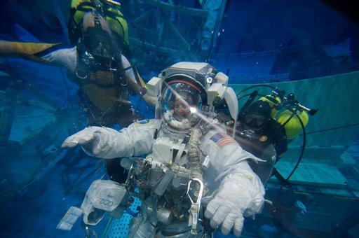 Expedition 24 crew members Tracy Caldwell and Doug Wheelock during ISS EVA 1 91027 training