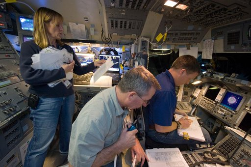 STS-130 crew during their Rendezvous sim time line training in the fixed base simulator in building 5