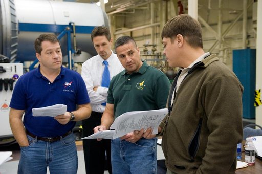 STS-130 crew training during their ISS EVA P/P 33105 training in the SSMTF