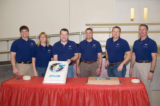STS-130 cake cutting ceremony