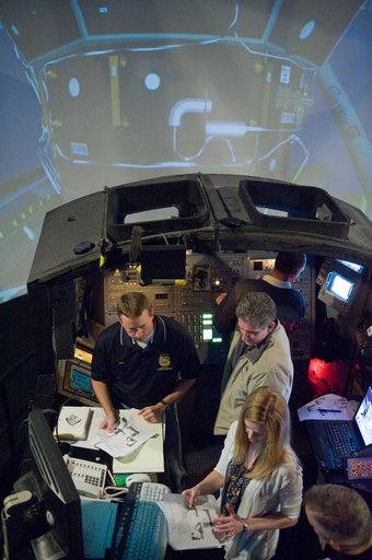 STS-132 crew during their PDRS N-TSK MRM training in the building 16 cupola trainer.