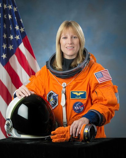 Official Astronaut Portrait of Kay Hire in individual ACES suit.