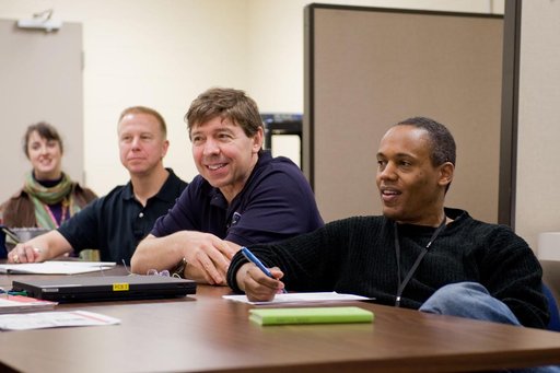 STS-133 crew during STS Response to Joint Emergency training with instructor Troy Williams