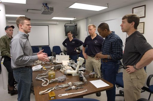 STS-133 crew during ISS Small Tools training with instructor Jake Delap.