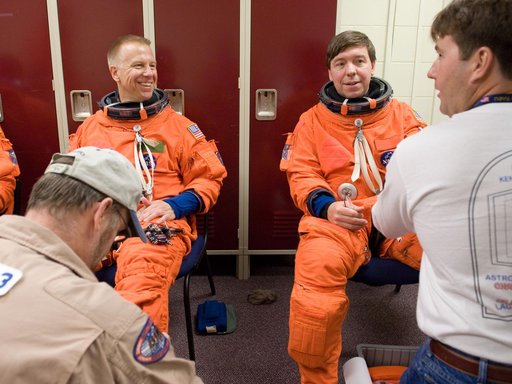STS-133 crew during Payload Egress training in Full Fuselage Trainer (FFT)