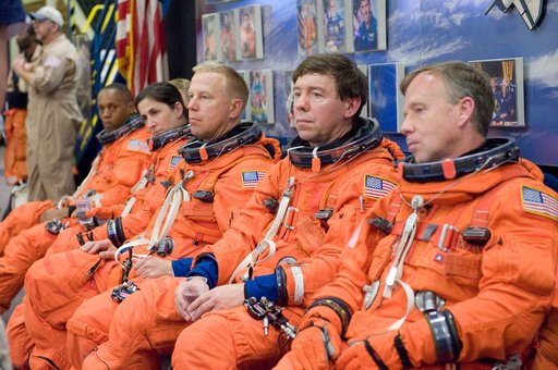 STS-133 crew during Payload Egress training in Full Fuselage Trainer (FFT)