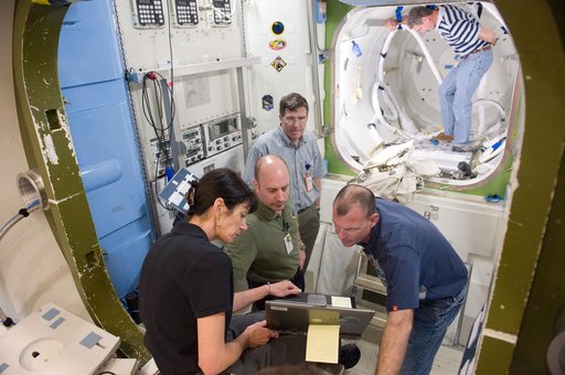 STS-132 crew during ISS TOOL Configuration with instructor Lisa Shore.