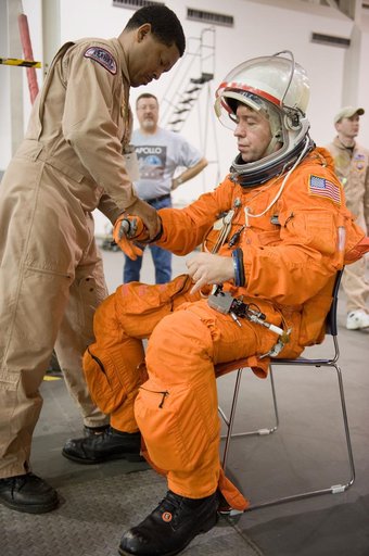 STS-133 crew during water survival training at the NBL