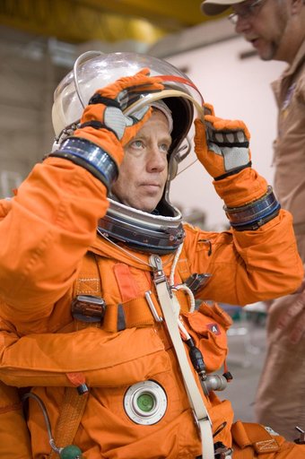 STS-133 crew during water survival training at the NBL