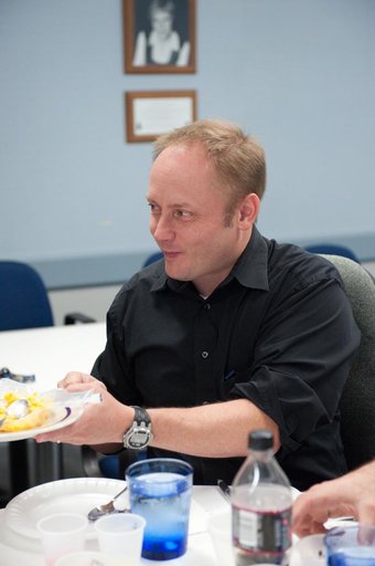 STS-134 crew during food tasting session in JSC Food Lab.