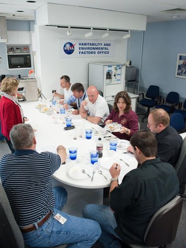 STS-134 crew during food tasting session in JSC Food Lab.